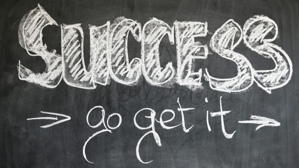 Chalk on a blackboard:  SUCCESS -> go get it